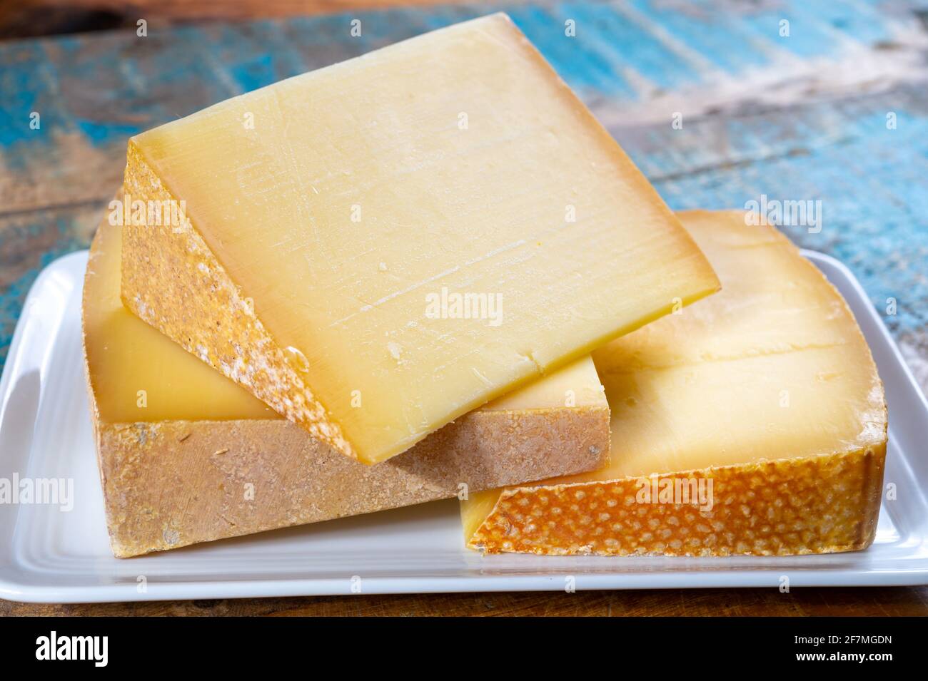 Cheese collection, French comte and Swiss gruyere cheeses close up