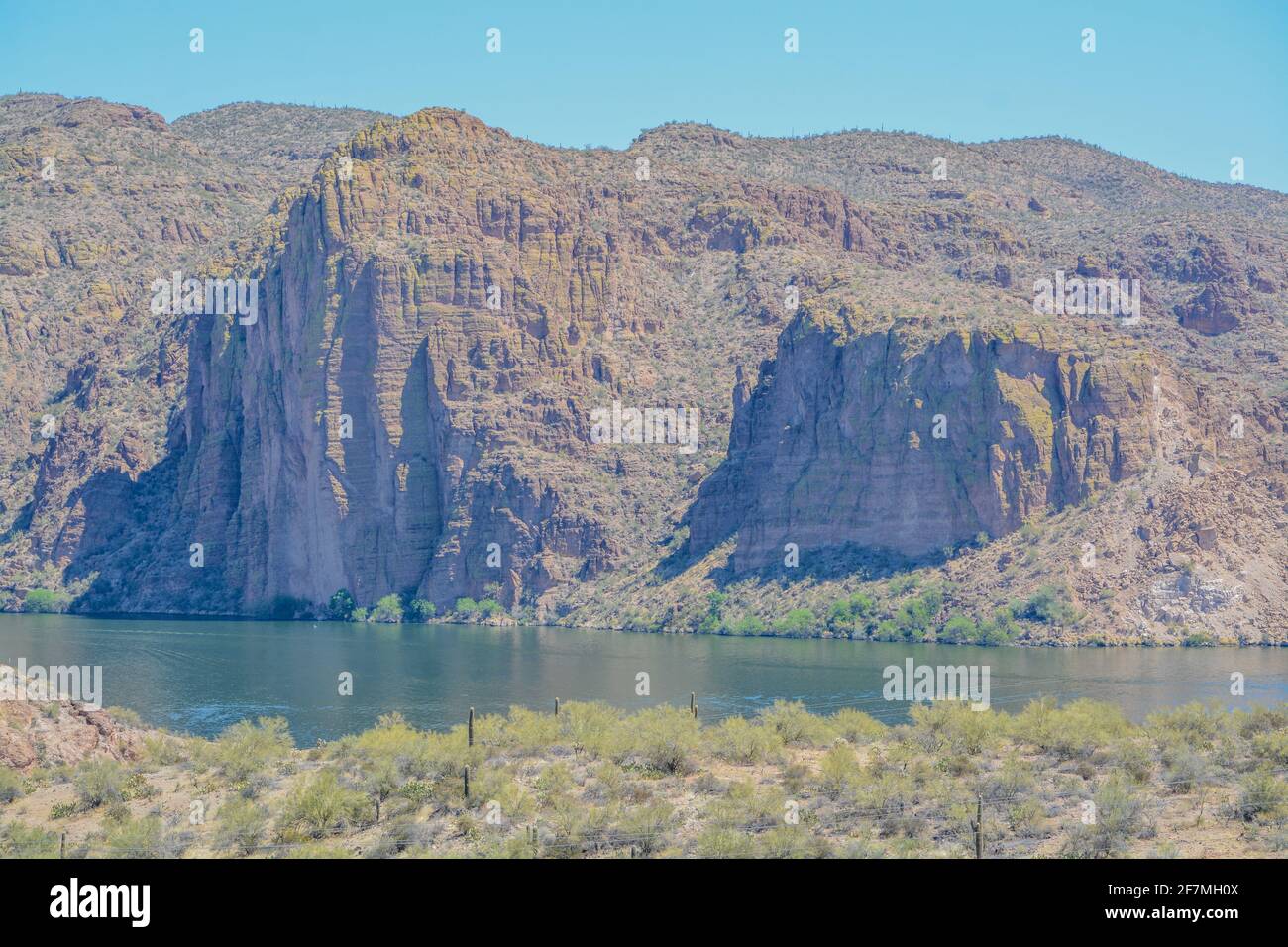 Beautiful desert rock formations line this secluded, Canyon Lake in