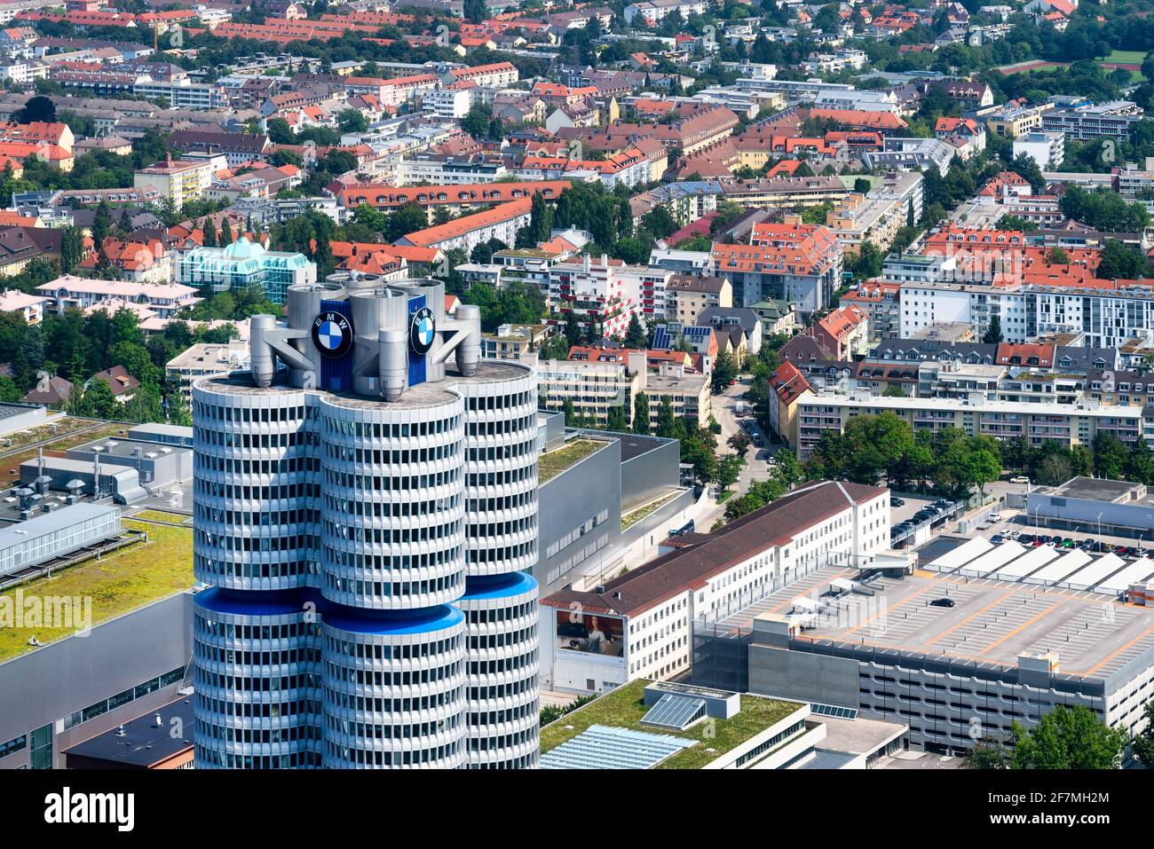 Munich, Germany, 08/24/2019: Aerial view of Munich with the BMW headquarters from the 291 m high Olympic tower (Olympiaturm). Stock Photo