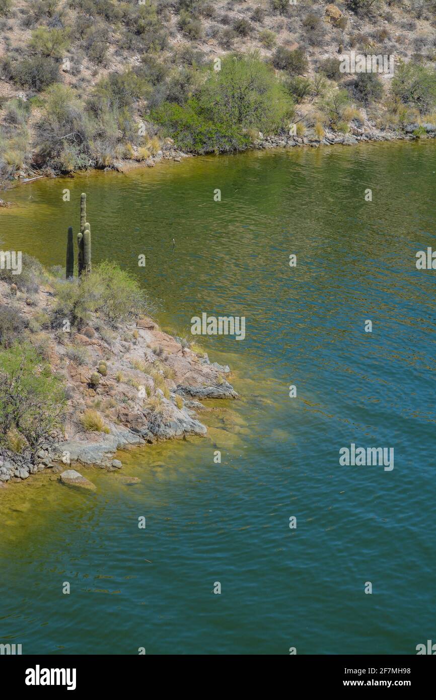 Beautiful desert rock formations line this secluded, Canyon Lake in