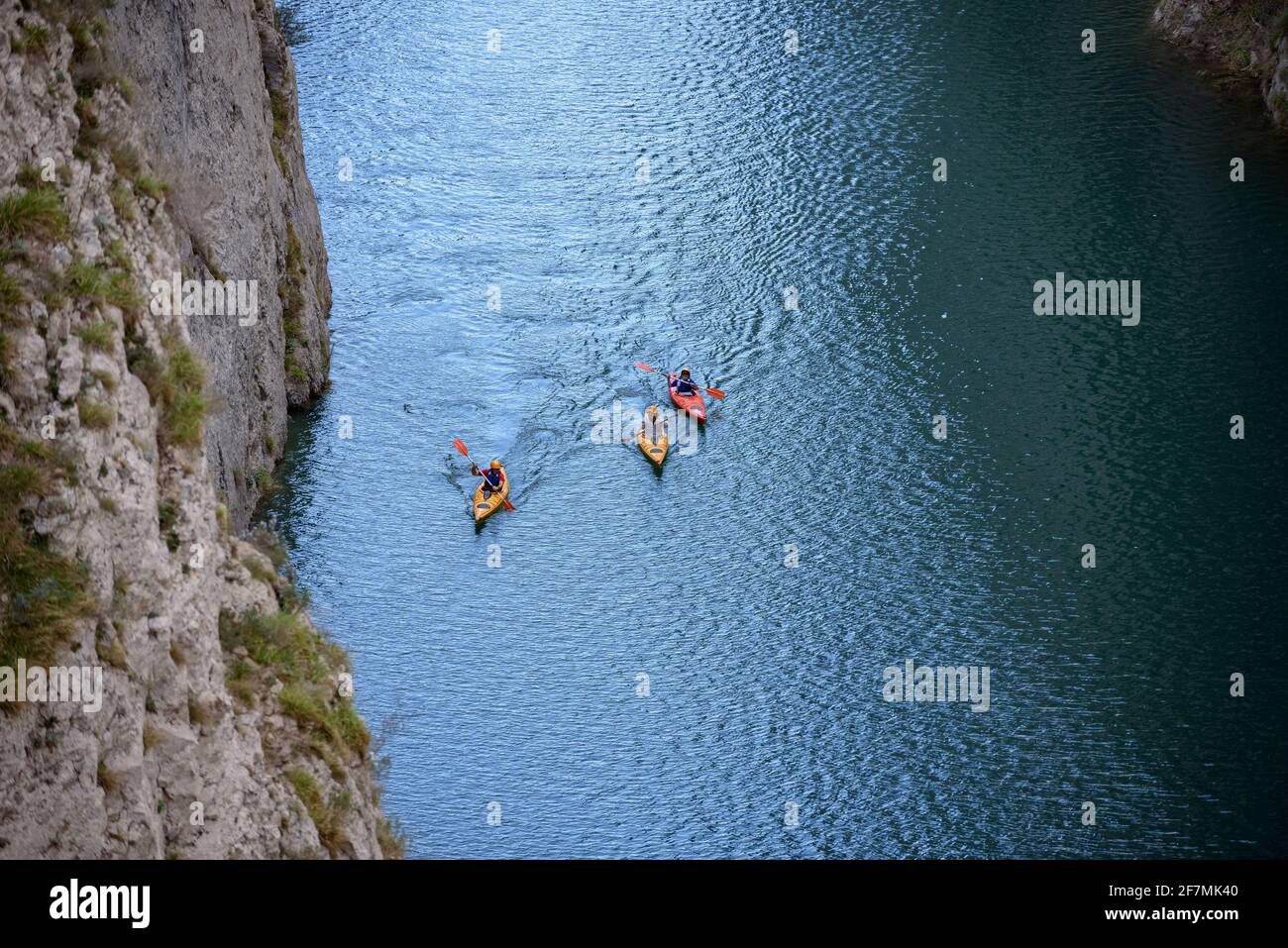 Congost de Mont-rebei gorge, in the Montsec mountain range, with some kayaks on the Noguera Ribagorzana river and the Canelles reservoir Lleida, Spain Stock Photo