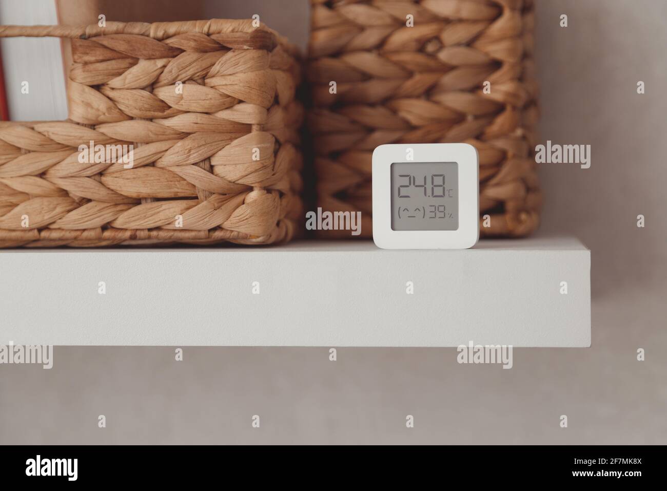 Digital temperature and humidity control on shelf in baby room Stock ...