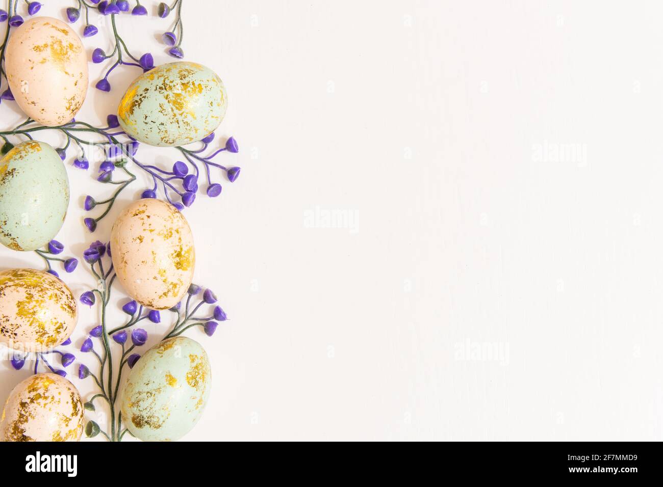 Colorful Easter eggs with spring blossom flowers isolated on white ...