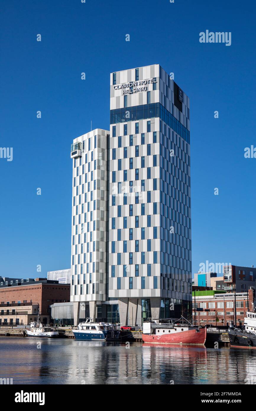 High-rise hotel Clarion against clear blue sky in Jätkäsaari or Länsisatama district in Helsinki, Finland Stock Photo