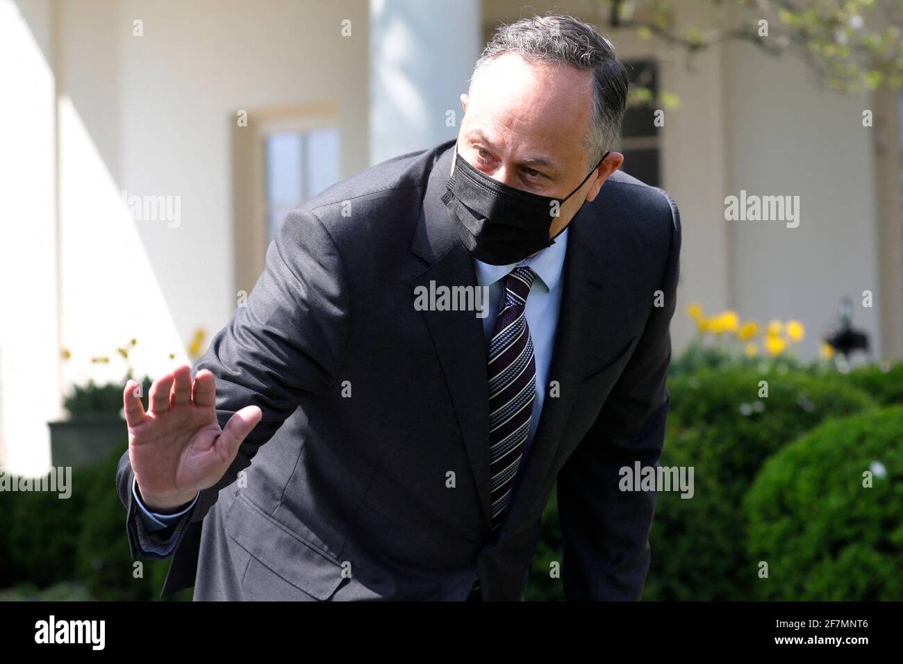 U.S. second gentleman Doug Emhoff waves as he arrives to listen remarks ...