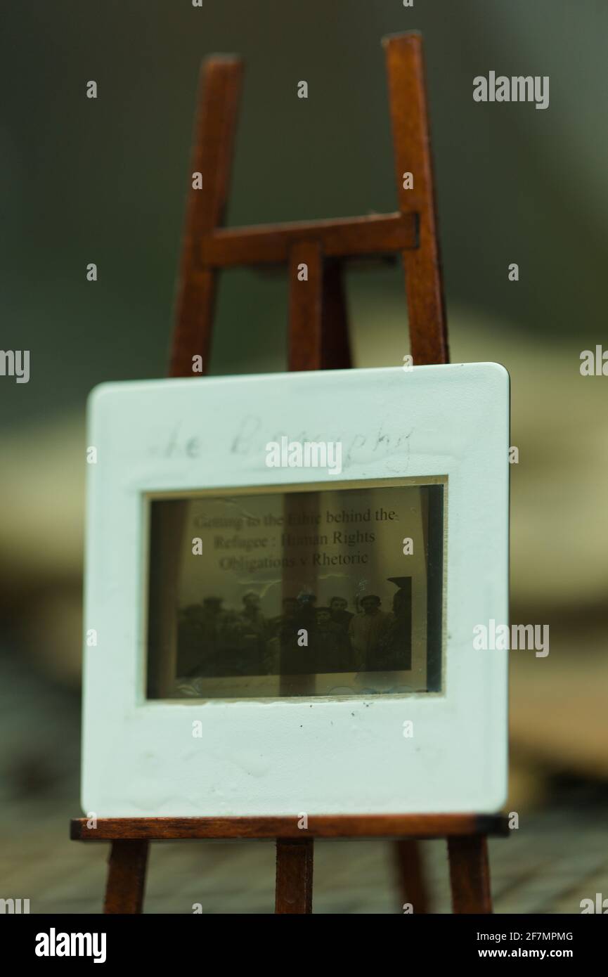 Concept - Human Rights Protection for for individuals fleeing persecution - a glass slide stands on a painters easel Stock Photo