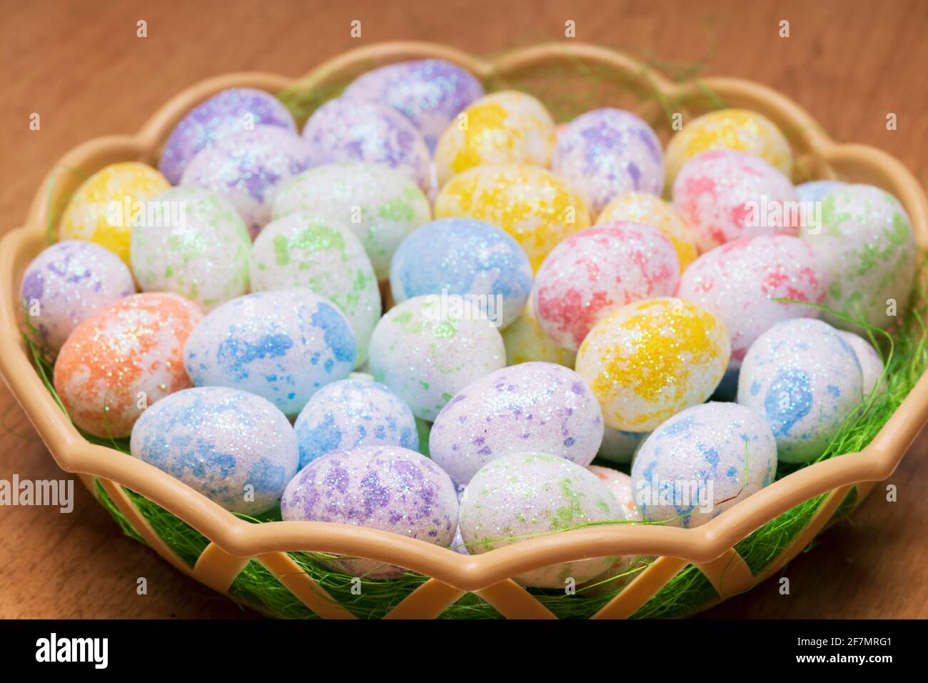 basket with colored Easter eggs. High quality photo Stock Photo
