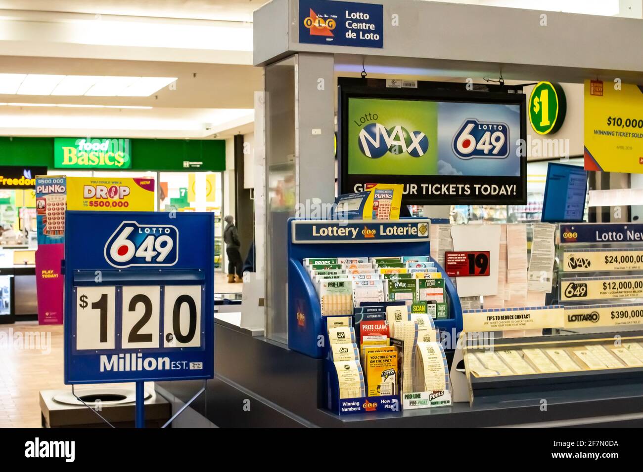 London, Ontario, Canada - February 26 2021: A lotto 649 ticket booth in Sherwood Forest Mall states that the jackpot is valued at 12 million dollars. Stock Photo