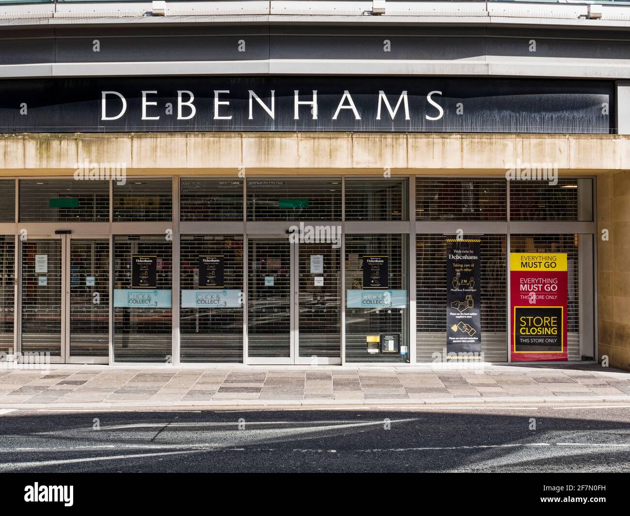 Window of Debenhams department store in Newcastle upon Tyne, UK, displaying final closing down sale signs. Stock Photo
