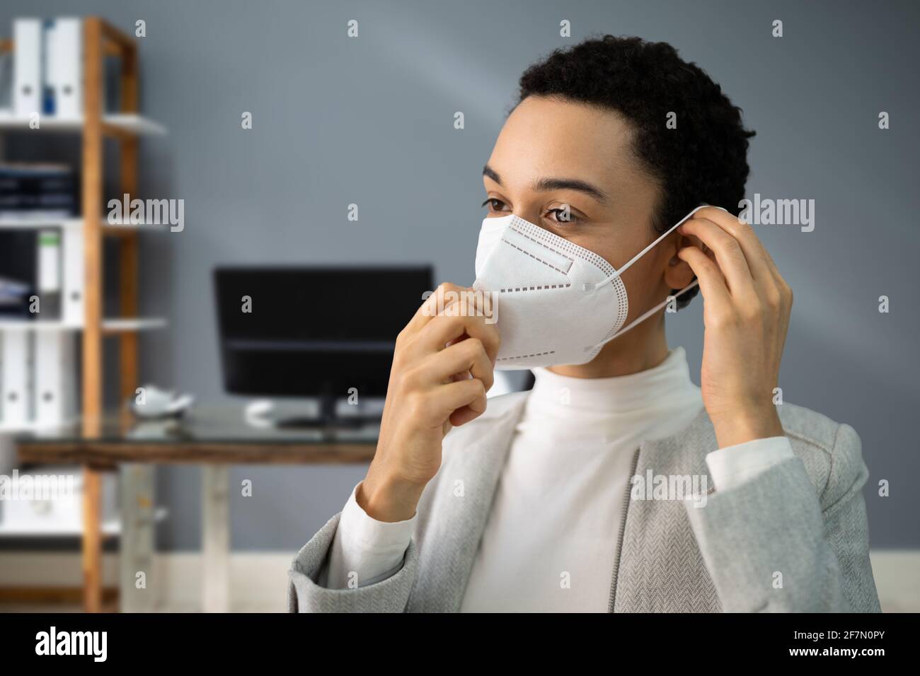 African American Woman Wearing Covid Medical Mask Stock Photo - Alamy