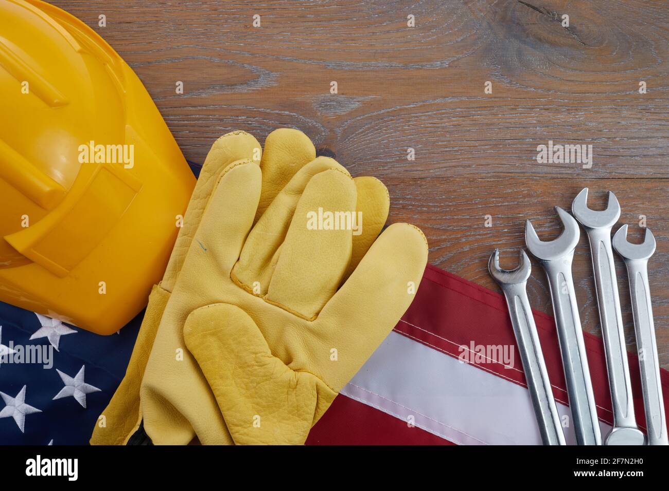 Happy labor day. Construction tools with hamlet and USA flag. Stock Photo