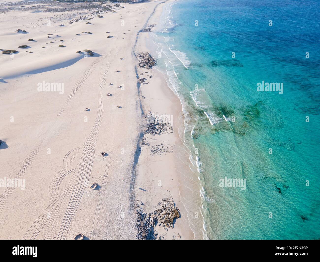 Endless sandy beach with turquoise water aerial view. Corralejo, Fuerteventura, Canary Islands Stock Photo