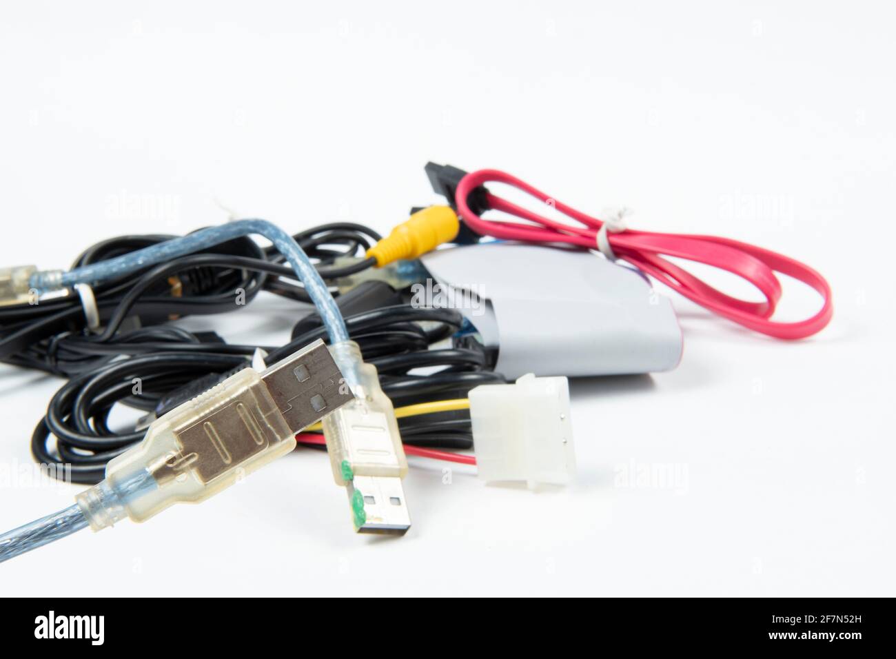 technological waste that remains in residence as computer cables Stock Photo