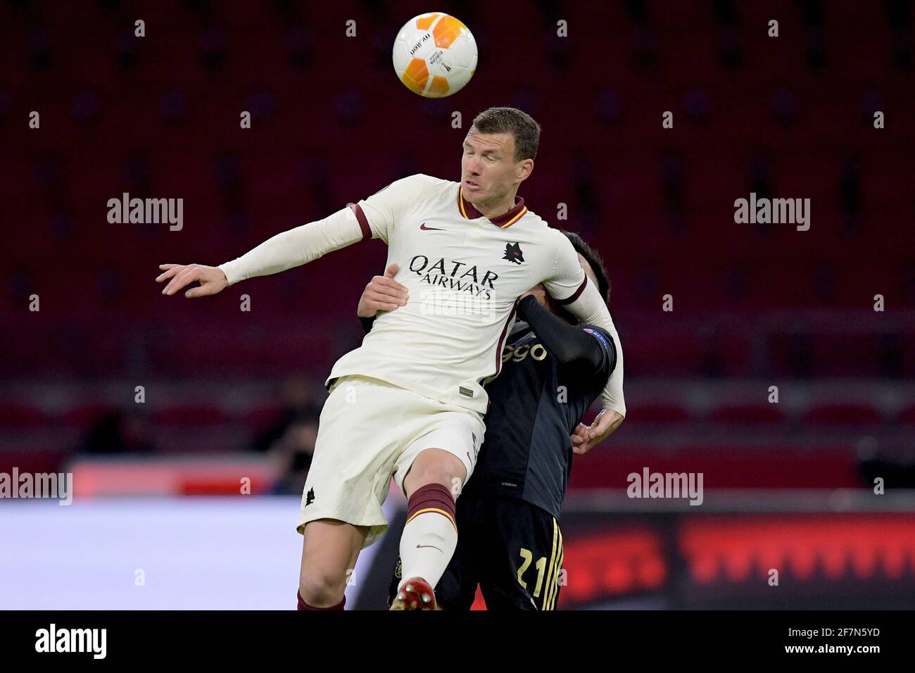 AMSTERDAM , NETHERLANDS - APRIL 8: Edin Dzeko of AS Roma, Lisandro Martinez of Ajax during the UEFA Europe League match between Ajax  and AS Roma  at Stock Photo