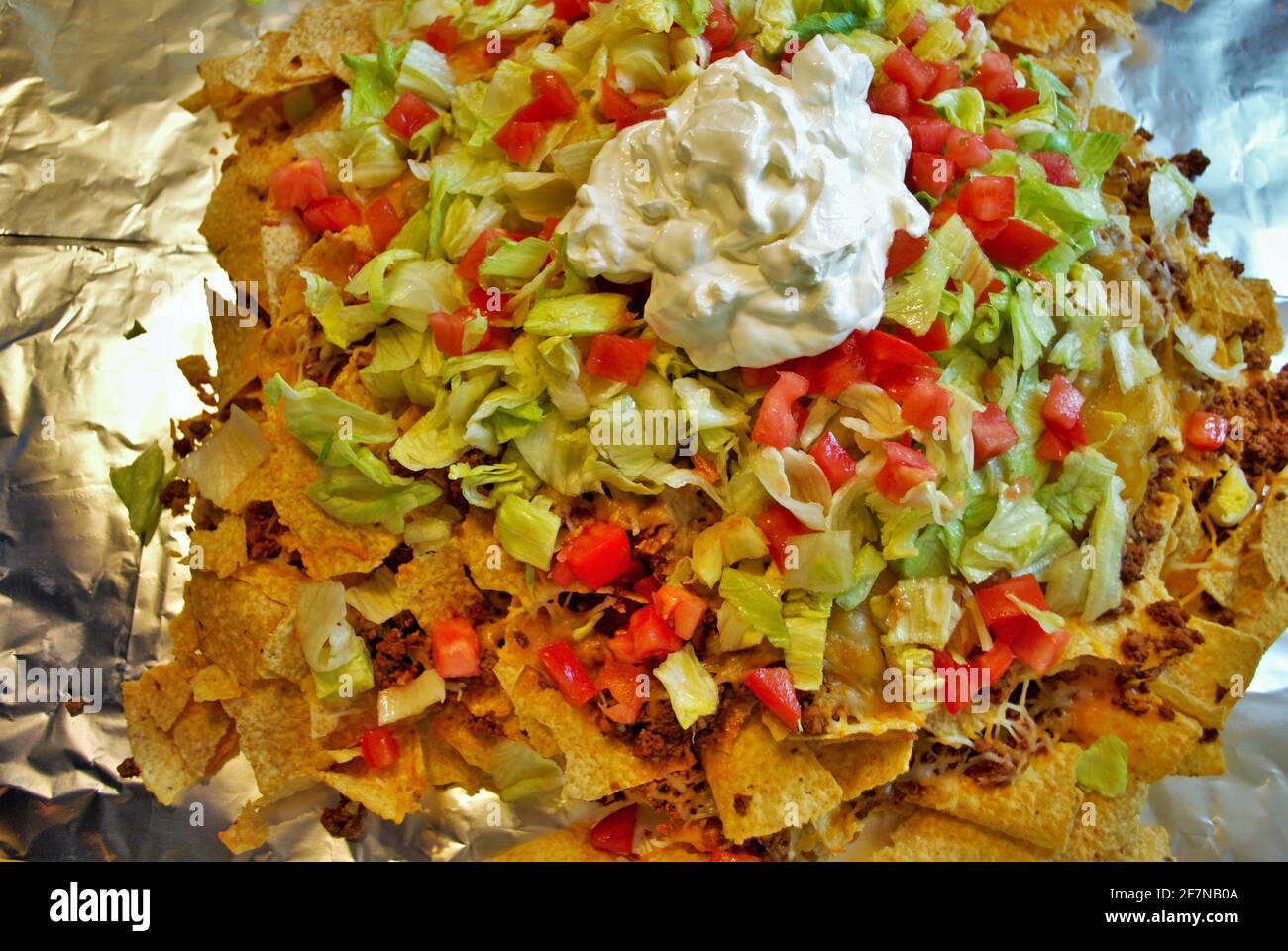 Nacho table kitchen table wrapped in aluminum foil and covered with