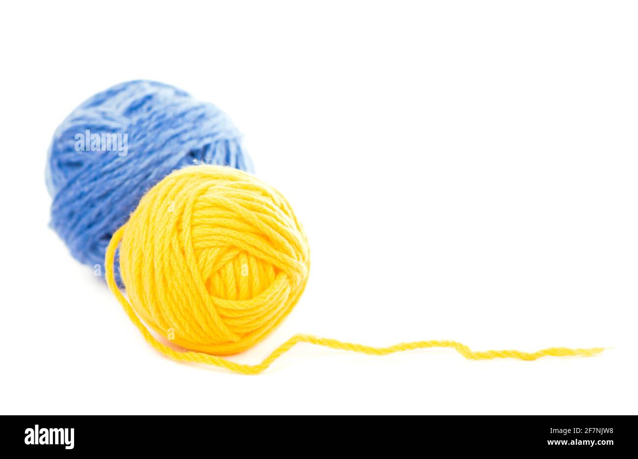 needles for knitting on the white background Stock Photo - Alamy