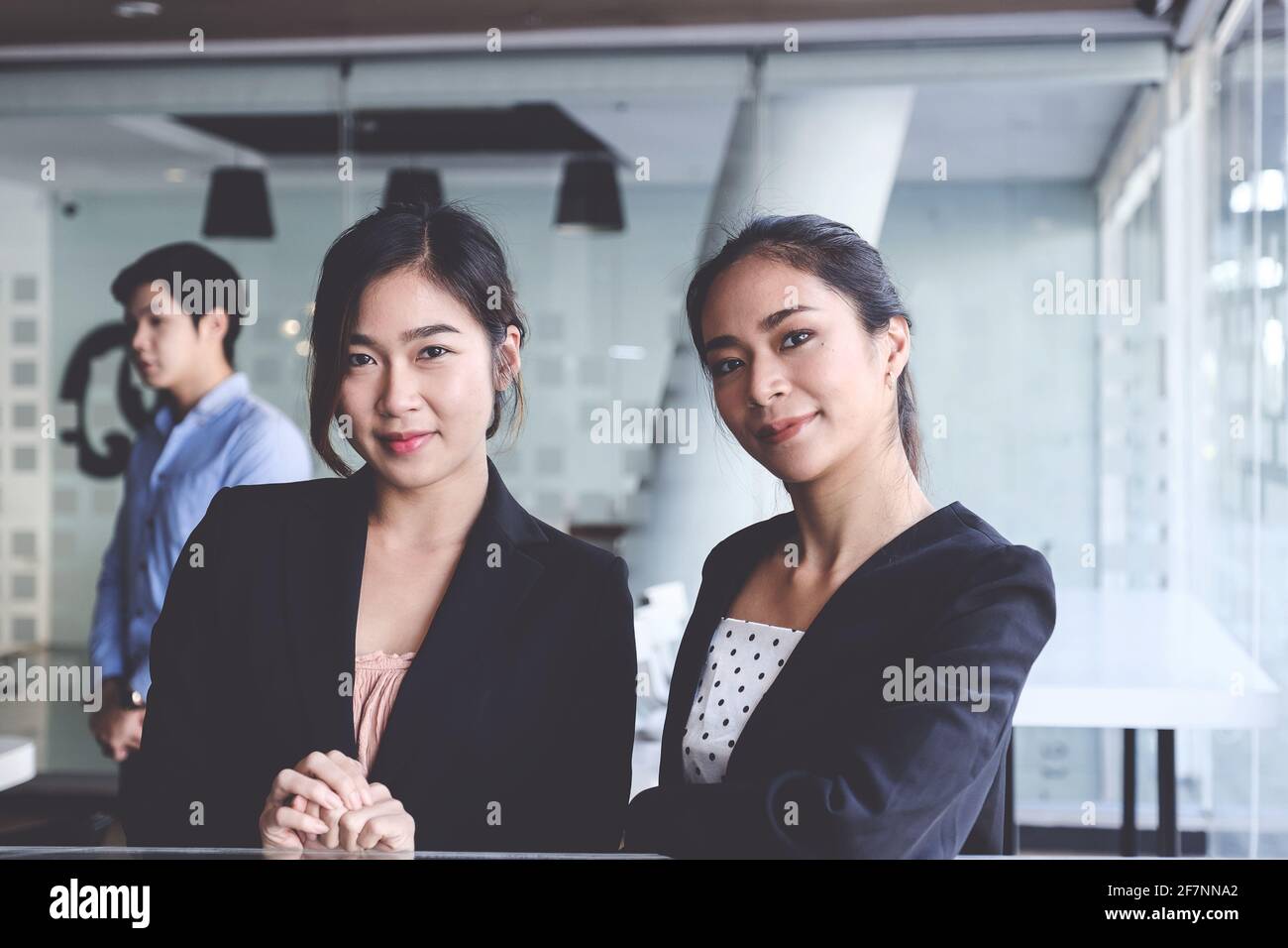 Portrait Group of Fund managers with cilent on background. Stock Photo