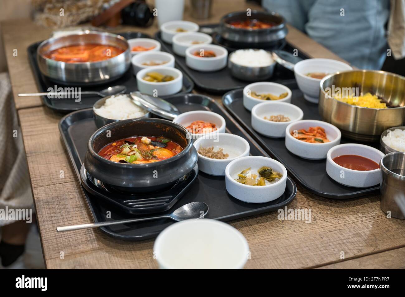 Various of Korean food with spicy soup, kimchi, noodles and vegetable
