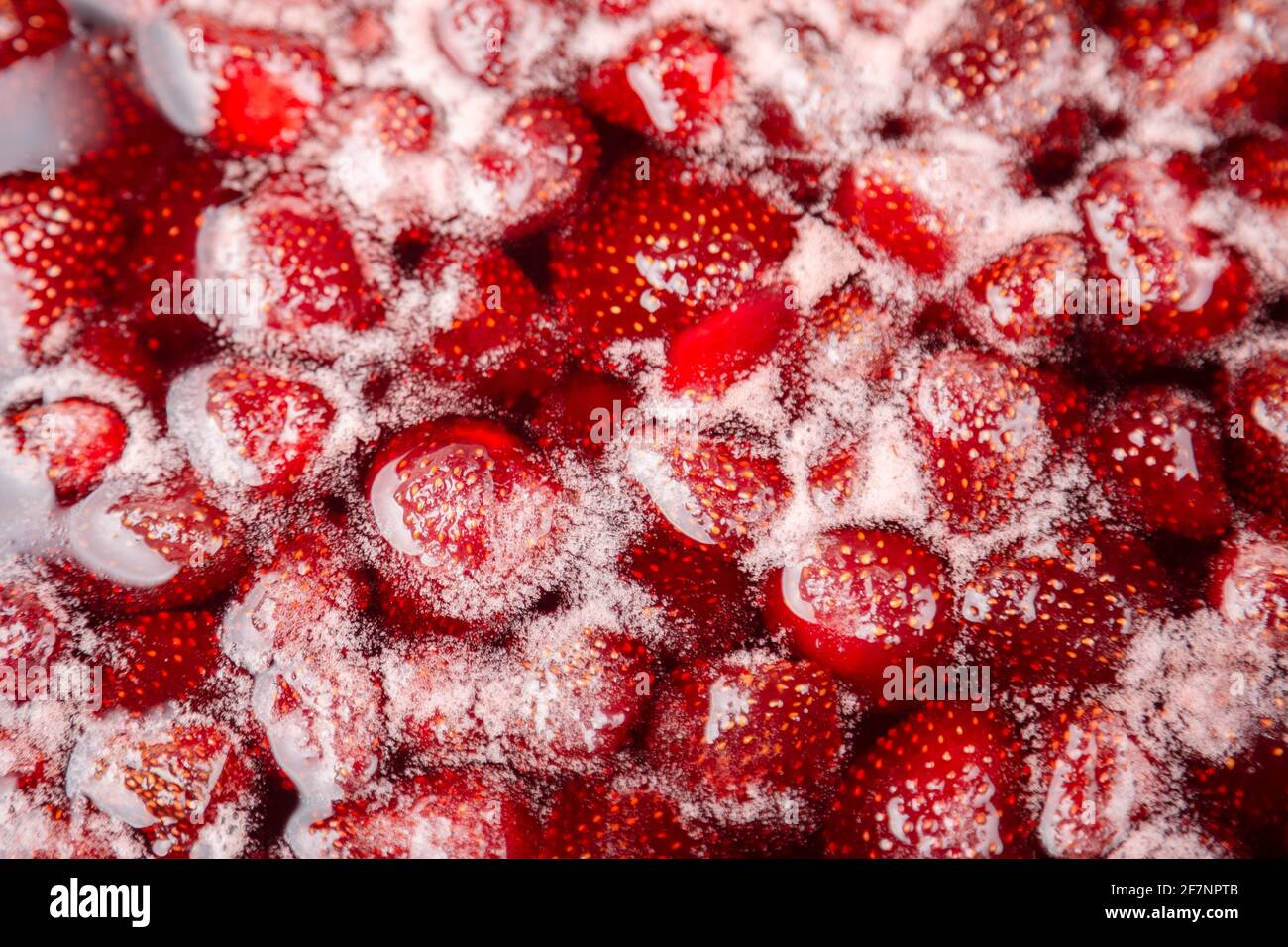 Homemade Strawberry jam in making progress boiling. Process of making