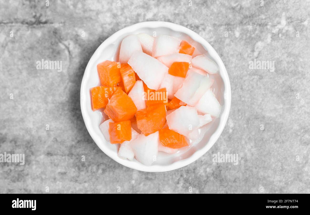 Top view Korean side dish pickled radish and carrot seasoning with
