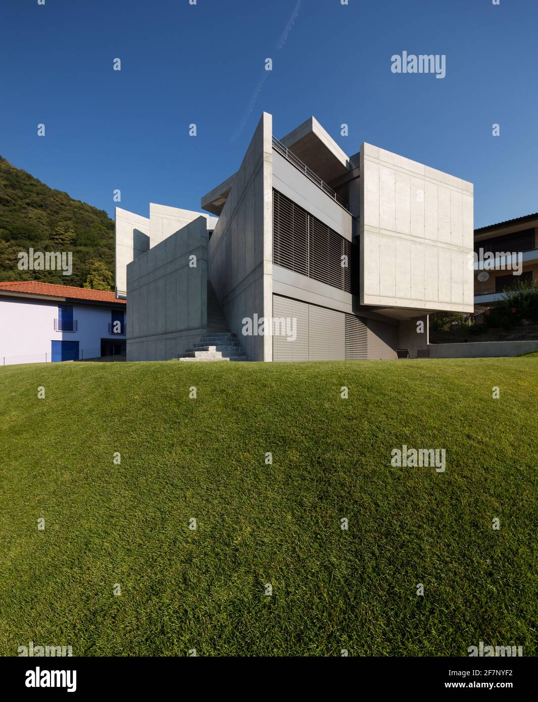 Modern villa surrounded by green. Nobody inside Stock Photo