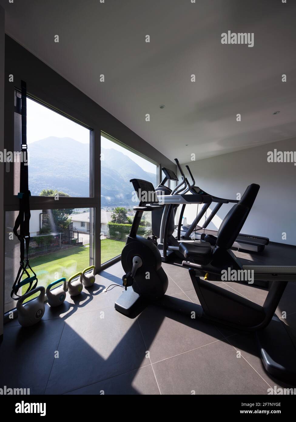 Personal gym in modern villa with wonderful view. Nobody inside Stock Photo