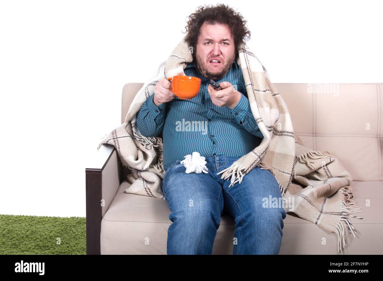 Cold and sick guy on the couch Stock Photo Alamy