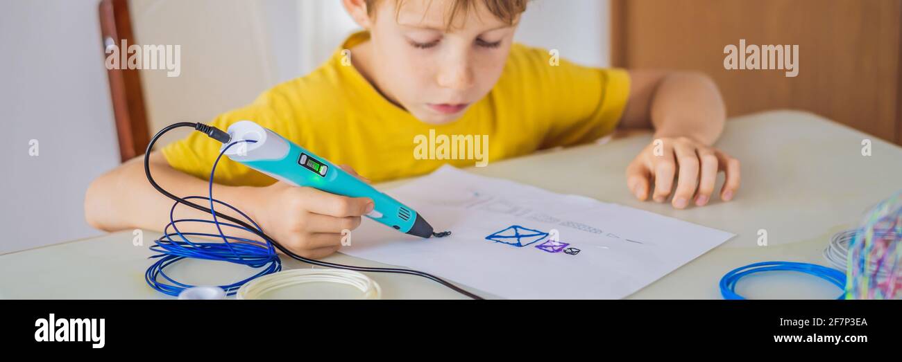 Kid using 3d printing drawing pen. Creative, leisure, technology education concept BANNER, LONG FORMAT Stock Photo