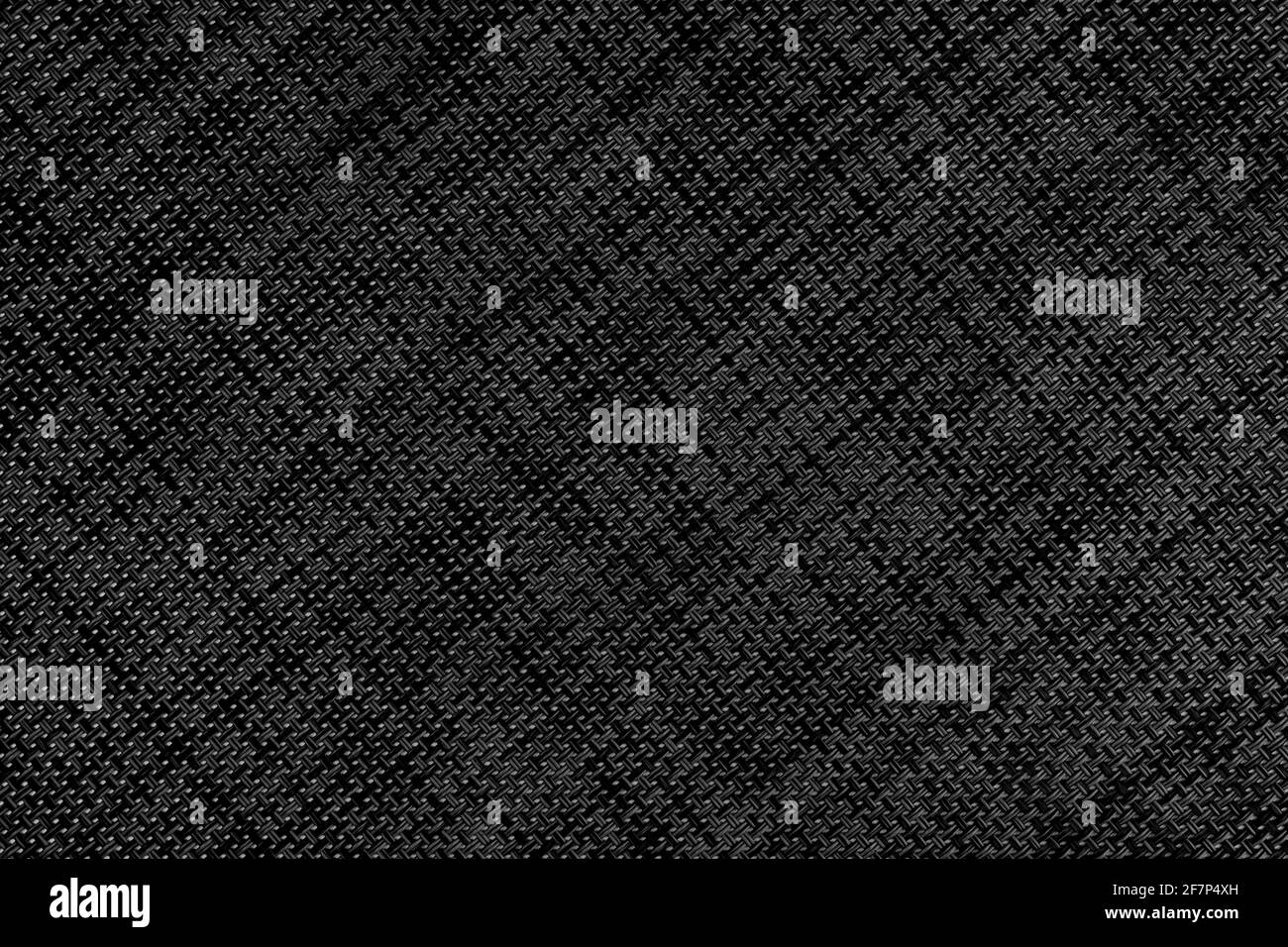 Black abstract textured wicker surface with a diagonal geometric pattern. Dark embossed background Stock Photo