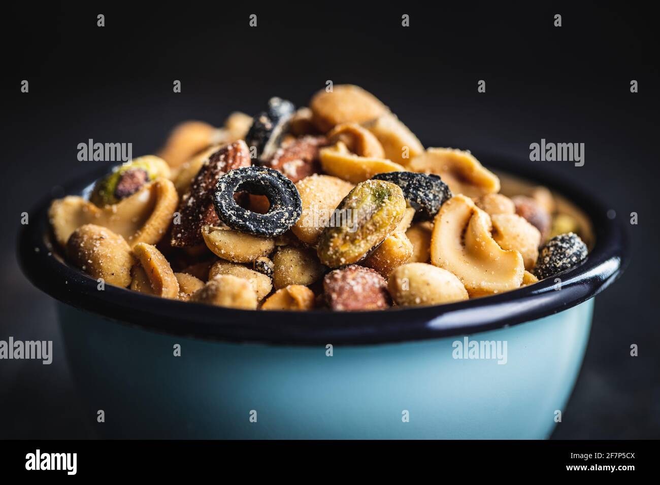 Mix of salted nuts in bowl Stock Photo Alamy