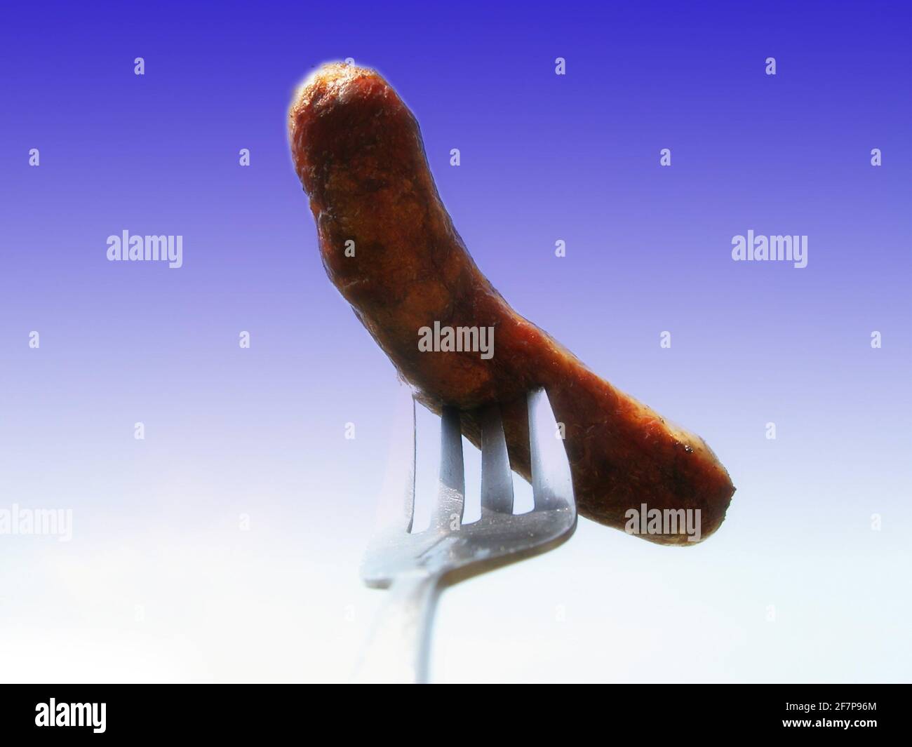 barbecue sausage on a fork, Austria Stock Photo