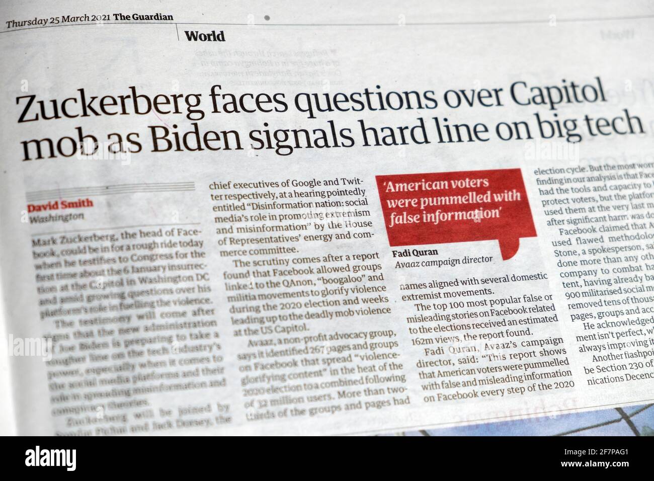 'Zuckerberg faces questions over Capitol mob as Biden signals hard line on big tech' newspaper headline article in Guardian 25 March 2021 London UK Stock Photo