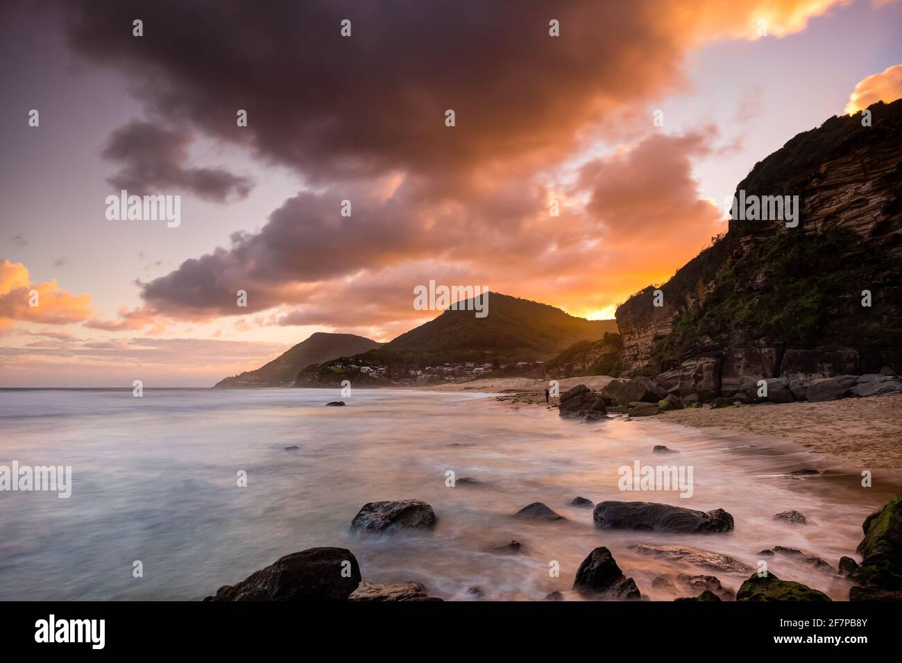 Sunset Clouds over Stanwell Park Beach and Community Stock Photo