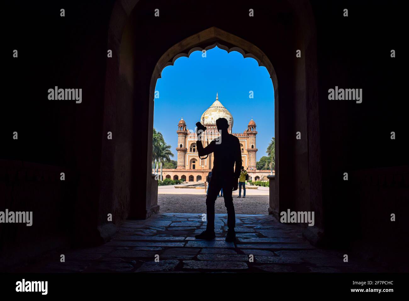 silhouette portrait of a man at safdarjung tomb.it is a red sand stone marble monument in delhi,india. Stock Photo