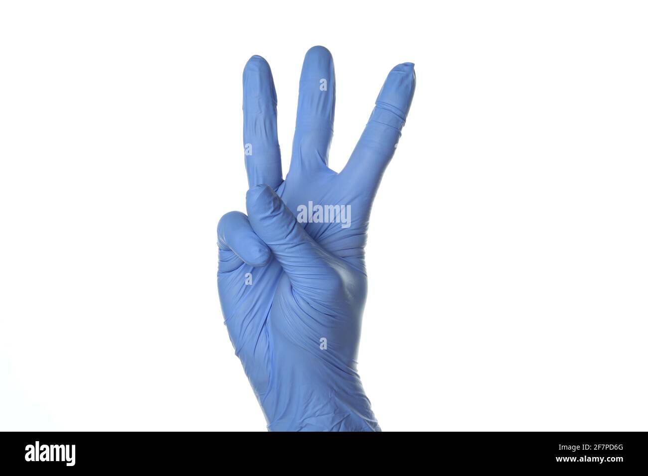 Hand in medical glove show three fingers isolated on white background Stock Photo Alamy