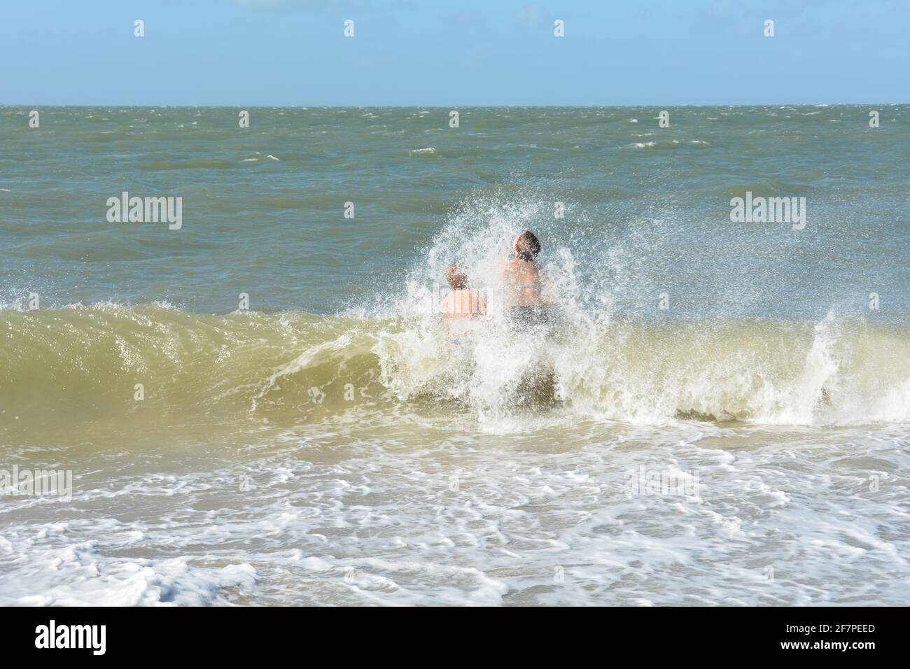 Children splashing sea hi-res stock photography and images - Alamy