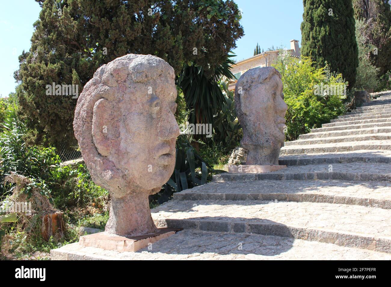 Stone head sculpture on the Caimari Steps, Pollensa Stock Photo Alamy