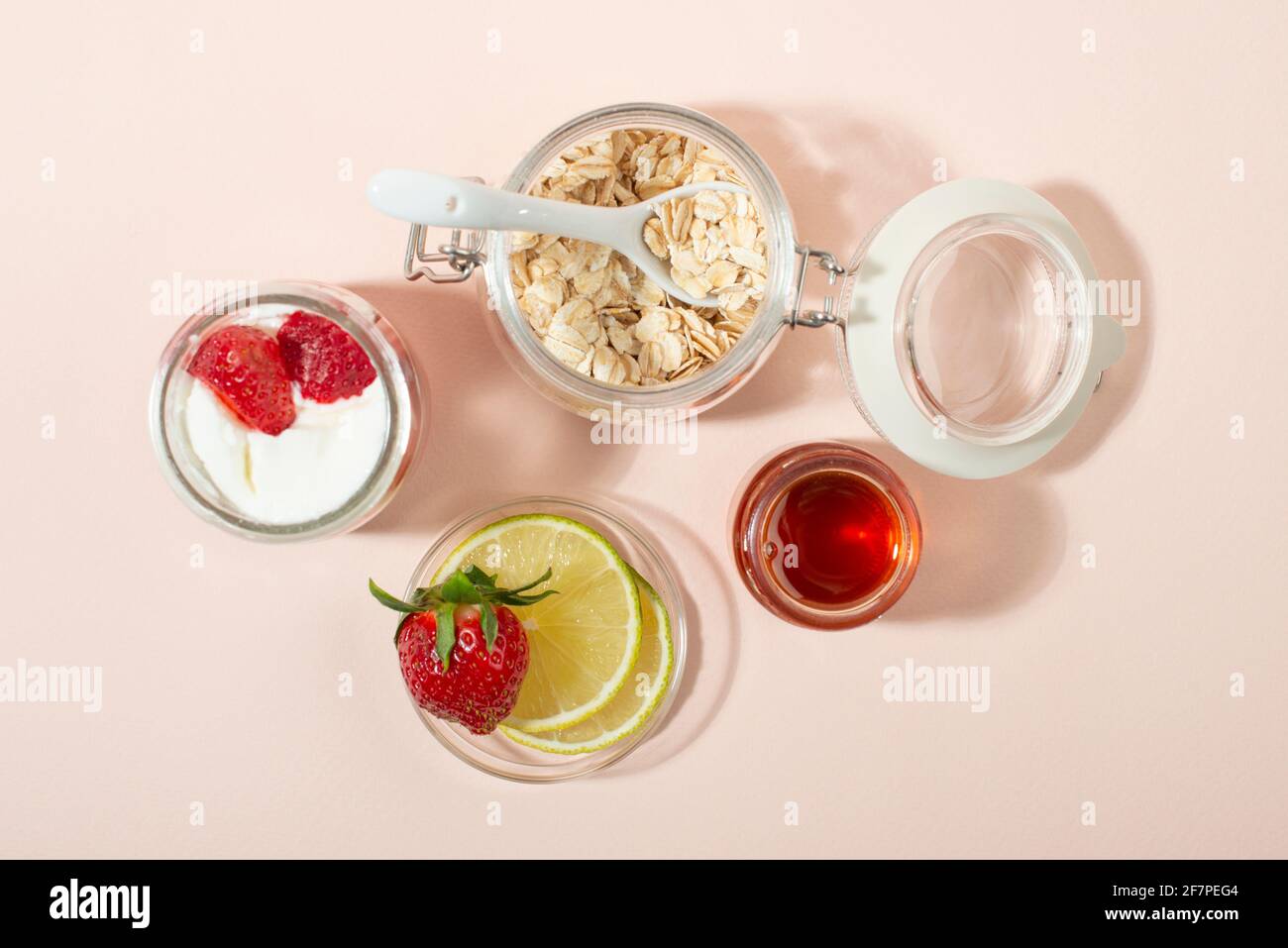 Homemade strawberry face mask ingredients strawberry, yoghurt, honey, lemon, oatmeal. DIY