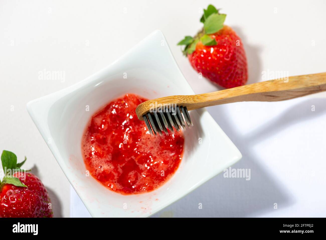Strawberry for teeth cleaning. DIY homemade personal hygiene products Stock  Photo - Alamy