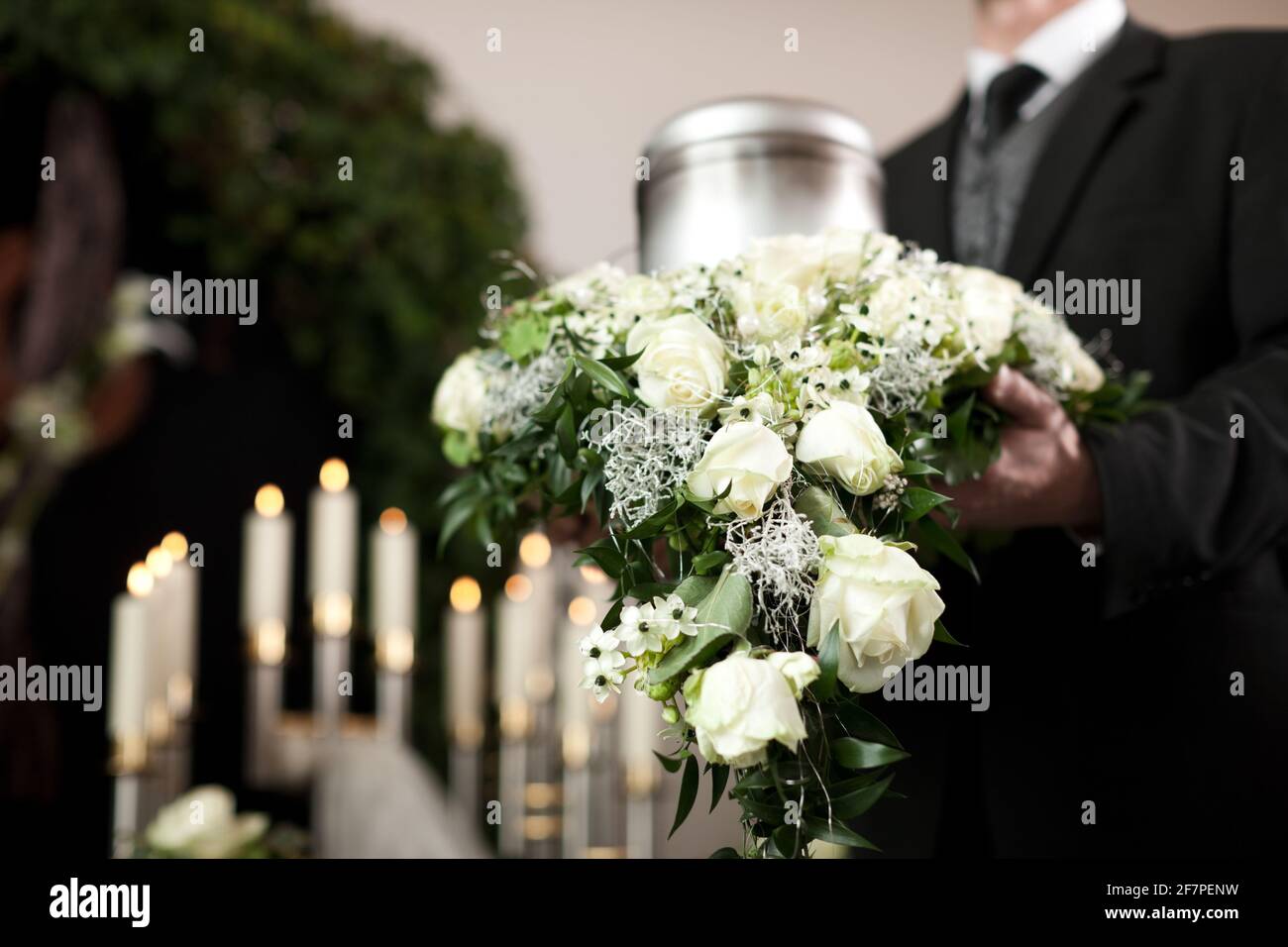 Religion, death and dolor  - funeral and cemetery; urn funeral Stock Photo