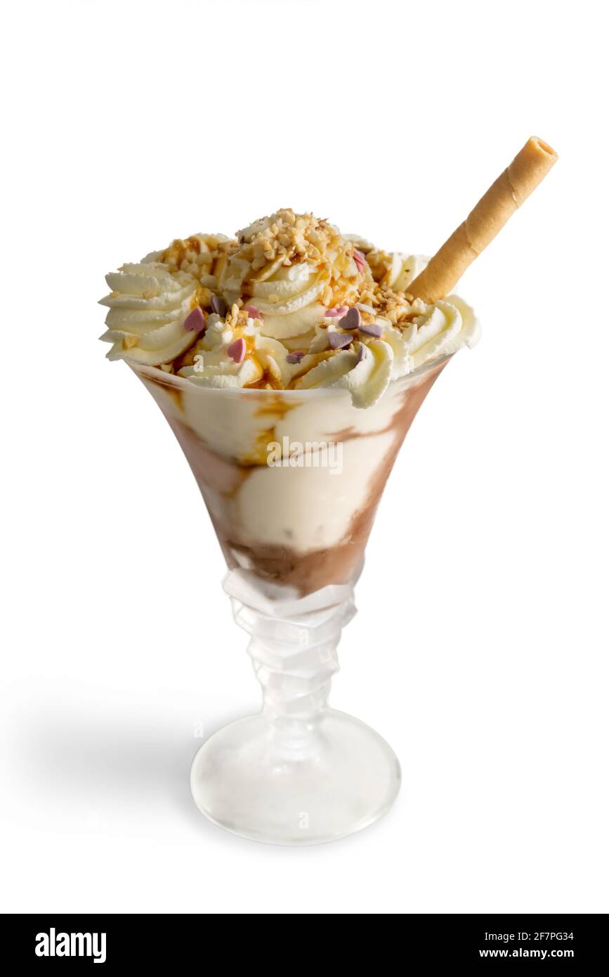 Affogato coffee ice cream with chopped hazelnuts isolated on white