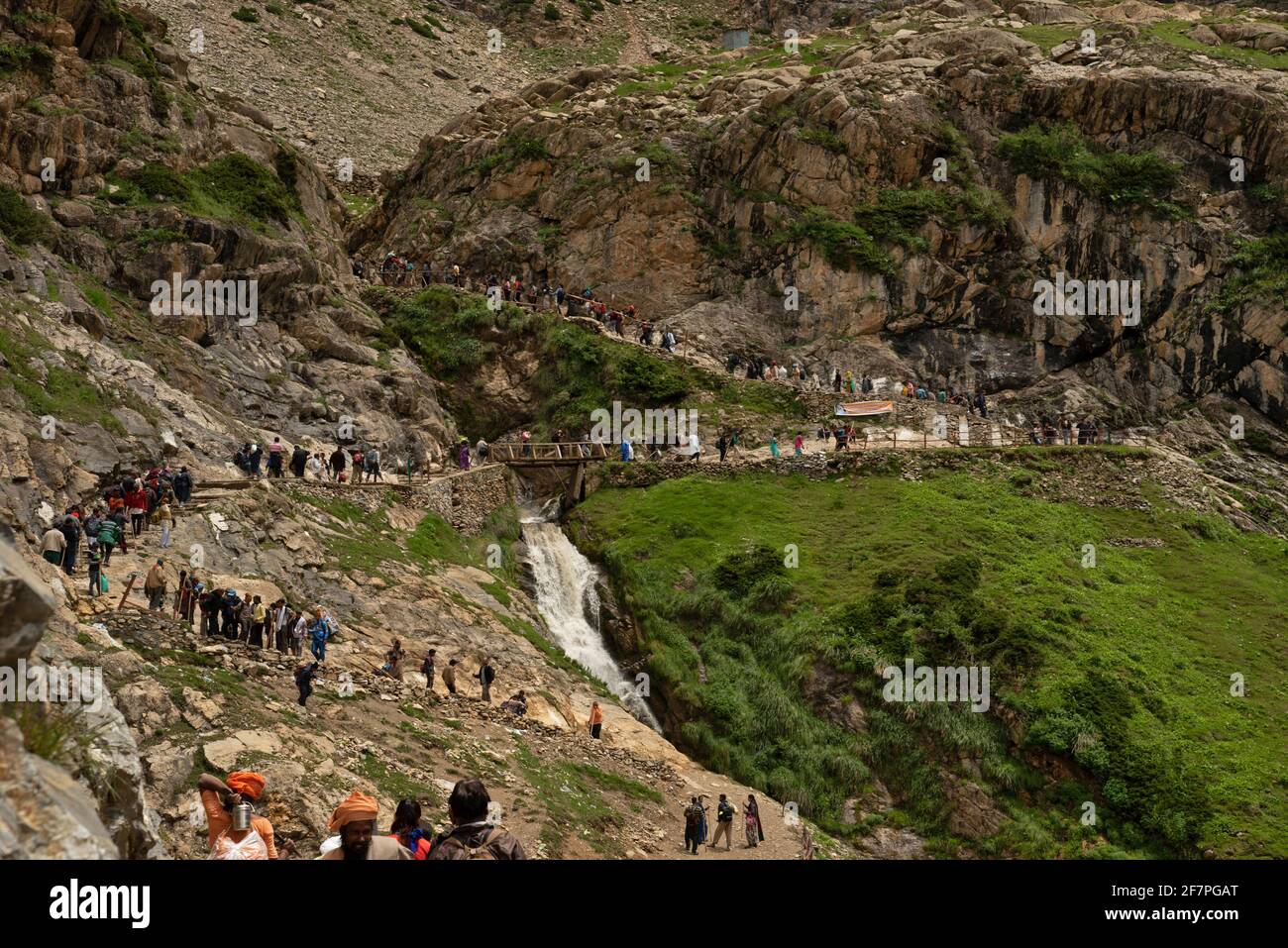Tourist walking towards basecamp at Tisu Top, Jammu and Kashmir, India Stock Photo