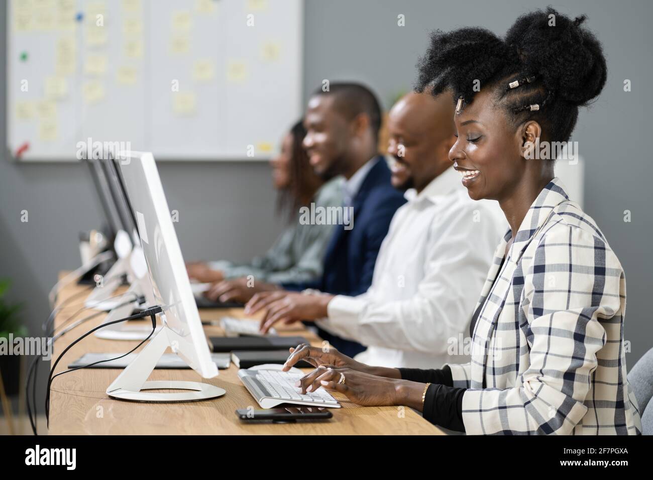 African American Customer Call Center Agent Team Stock Photo