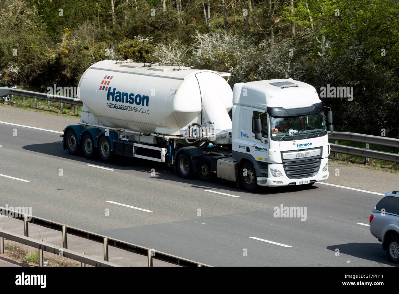 A DAF Hanson cement lorry on the M40 motorway, Warwickshire, UK Stock Photo