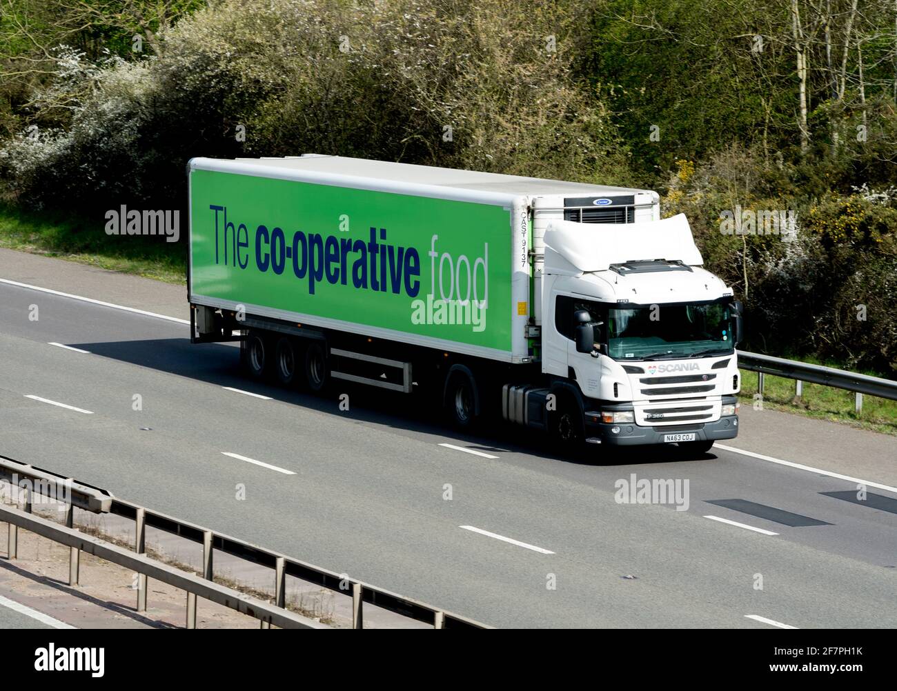 A Scania Co-operative Food lorry on the M40 motorway, Warwickshire, UK Stock Photo