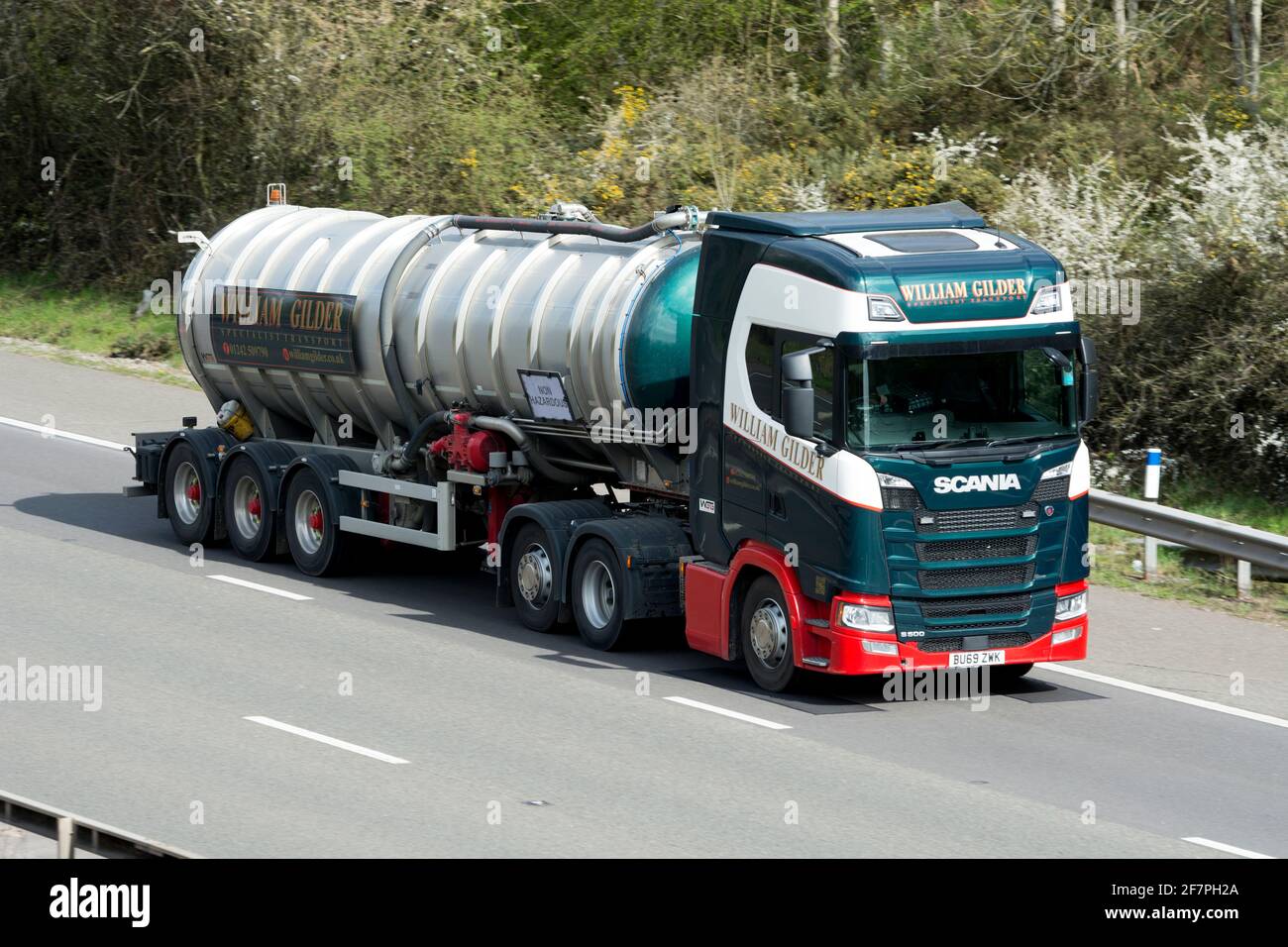 A Scania William Gilder tanker lorry on the M40 motorway, Warwickshire, UK Stock Photo