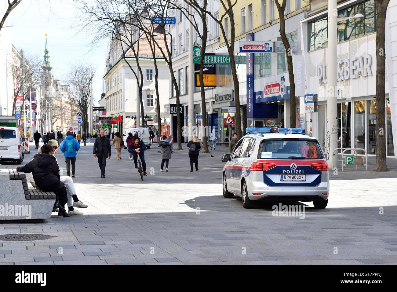 Vienna, Austria. 9th Apr, 2021. Police on Mariahilferstrasse control the exit restrictions Stock Photo