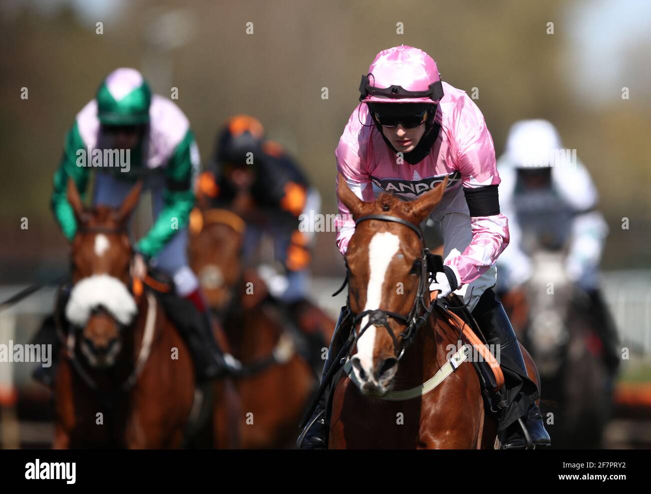 Harry Bannister riding For Pleasure, wearing a black armband in honour of the late Prince Philip, Duke of Edinburgh, in the Betway Top Novices' Hurdle during Ladies Day of the 2021 Randox Health Grand National Festival at Aintree Racecourse, Liverpool. Picture date: Friday April 9, 2021. Stock Photo