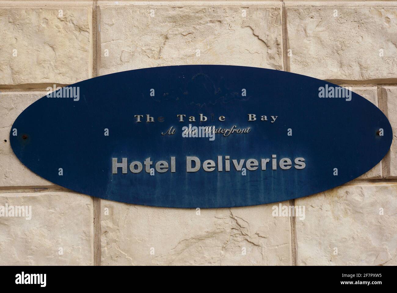 Hotel Deliveries sign at The Table Bay Hotel, V&A Waterfront, Cape Town, South Africa. Stock Photo