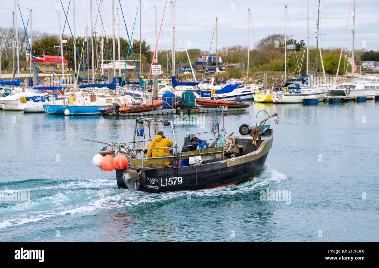 'Doodle Bug', registry LI579, a small fishing boat (Seal Islander 640C) on the River Arun estuary in Littlehampton, West Sussex, England, UK. Stock Photo